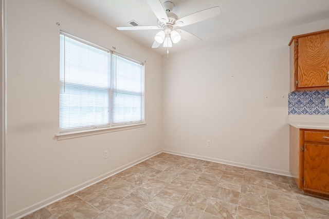 218 Susie Dr, Winchester, TN 37398 - unfurnished dining area with ceiling fan and baseboards