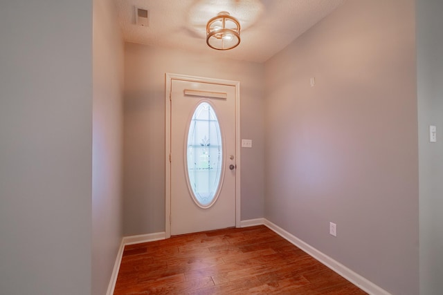 218 Susie Dr, Winchester, TN 37398 - foyer featuring wood finished floors and a textured ceiling