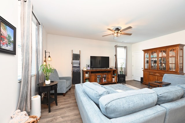 7050 Scotlyn Way, White House, TN 37188 - living area with light wood-type flooring and a ceiling fan