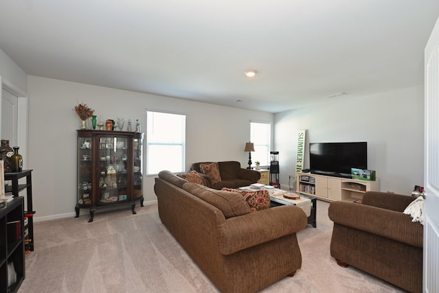 7050 Scotlyn Way, White House, TN 37188 - living area featuring light carpet and baseboards