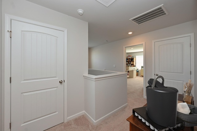 7050 Scotlyn Way, White House, TN 37188 - corridor featuring light colored carpet, an upstairs landing, and recessed lighting