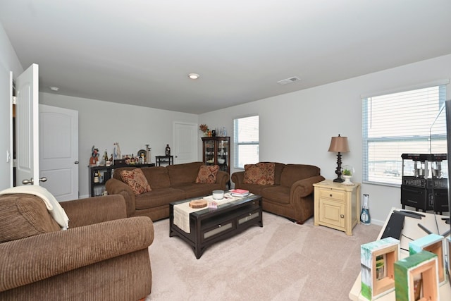 7050 Scotlyn Way, White House, TN 37188 - living room with light carpet and a dry bar