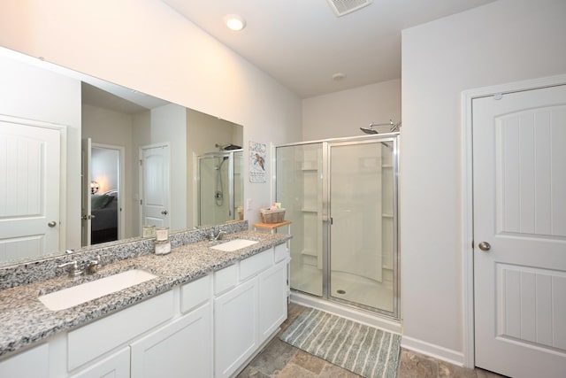 7050 Scotlyn Way, White House, TN 37188 - ensuite bathroom featuring a stall shower and double vanity