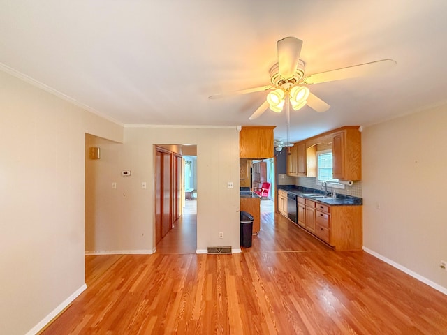 115 Horseshoe St, Pulaski, TN 38478 - kitchen with dishwasher, a ceiling fan, light wood finished floors, dark countertops, and ornamental molding