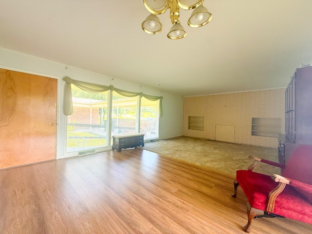 115 Horseshoe St, Pulaski, TN 38478 - living area with a chandelier and wood finished floors