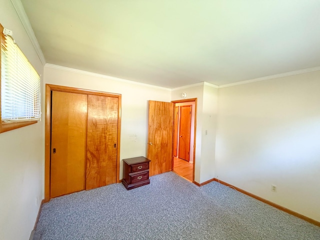 115 Horseshoe St, Pulaski, TN 38478 - unfurnished bedroom with a closet, carpet, and ornamental molding