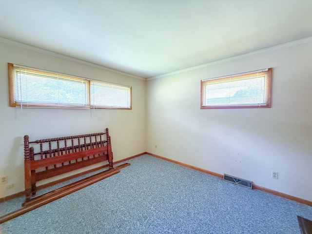 115 Horseshoe St, Pulaski, TN 38478 - unfurnished bedroom with carpet flooring, multiple windows, and ornamental molding