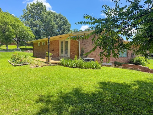 115 Horseshoe St, Pulaski, TN 38478 - view of front of property with a front yard and brick siding