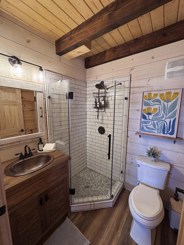 139 E Swan Ridge Rd, Hilham, TN 38568 - bathroom featuring wood finished floors, vanity, a stall shower, wooden walls, and a wood ceiling with exposed beams