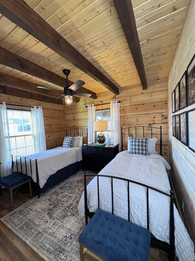 139 E Swan Ridge Rd, Hilham, TN 38568 - bedroom with wooden walls, wood finished floors, a wood ceiling with exposed beams, and ceiling fan