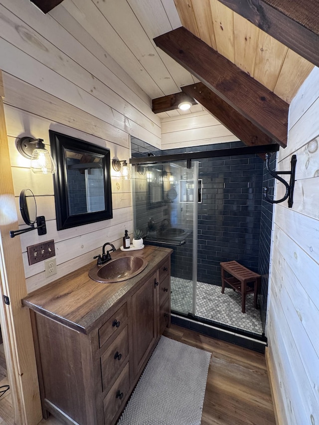 139 E Swan Ridge Rd, Hilham, TN 38568 - full bath with wood walls, a wooden ceiling with exposed beams, vanity, wood finished floors, and a shower stall