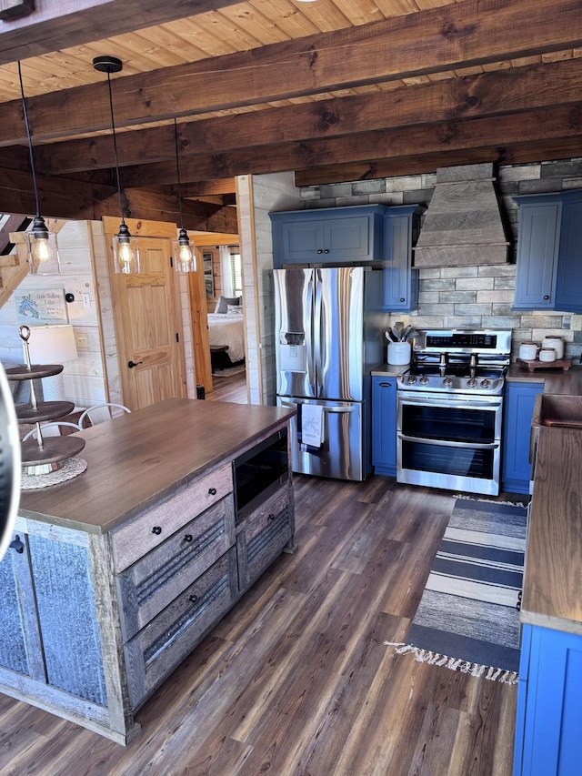 139 E Swan Ridge Rd, Hilham, TN 38568 - kitchen featuring appliances with stainless steel finishes, blue cabinetry, custom exhaust hood, dark wood-type flooring, and hanging light fixtures