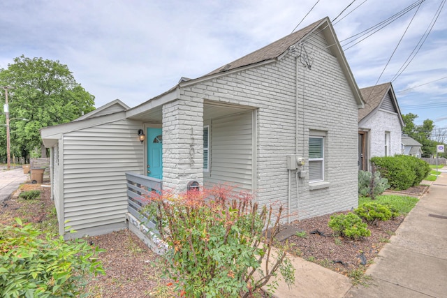 1205 Dr Db Todd Jr Blvd, Nashville, TN 37208 - view of side of property with brick siding and roof with shingles