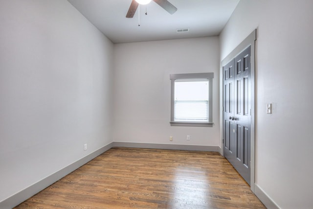 1205 Dr Db Todd Jr Blvd, Nashville, TN 37208 - unfurnished bedroom with wood finished floors, a ceiling fan, and a closet