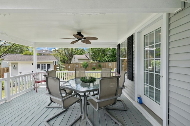 227 Riverbend Dr, Franklin, TN 37064 - wooden terrace with outdoor dining area, an outdoor structure, and ceiling fan