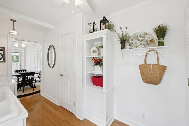 227 Riverbend Dr, Franklin, TN 37064 - corridor featuring light wood-type flooring, a decorative wall, and built in features