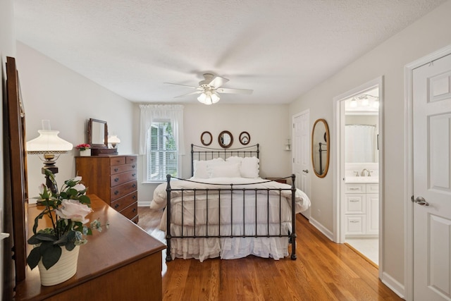 227 Riverbend Dr, Franklin, TN 37064 - bedroom featuring light wood-type flooring, ensuite bath, and ceiling fan