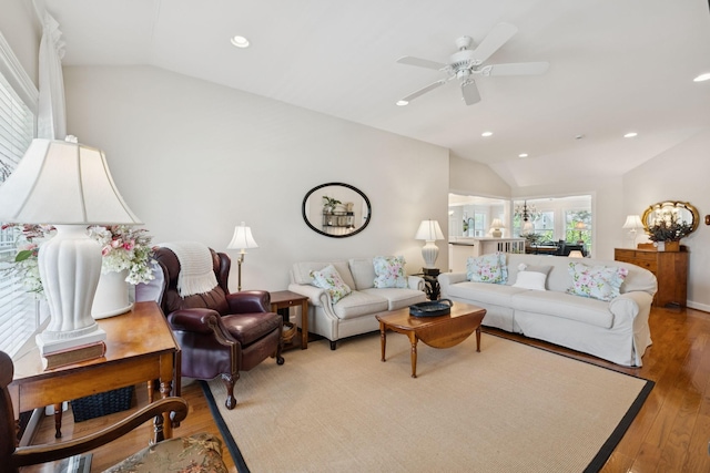227 Riverbend Dr, Franklin, TN 37064 - living room with vaulted ceiling, recessed lighting, ceiling fan, and light wood-style flooring