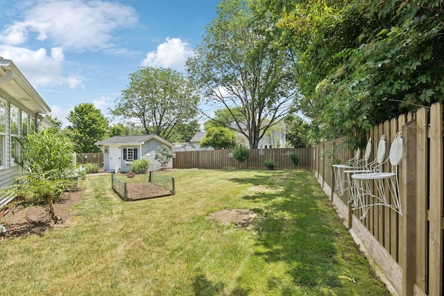 227 Riverbend Dr, Franklin, TN 37064 - fenced backyard featuring an outbuilding and a garden