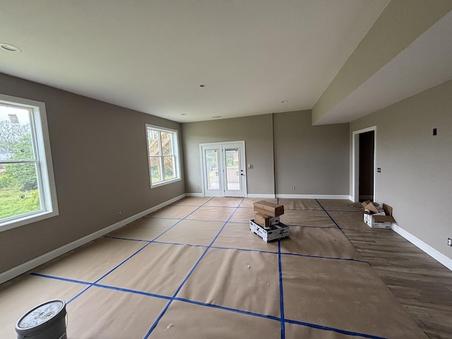 512 Smokey Rdg, Nolensville, TN 37135 - unfurnished living room with baseboards and wood finished floors