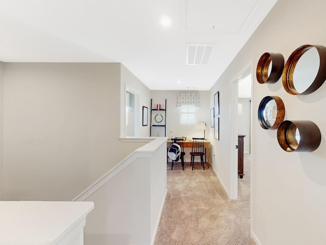 277 Subban Ct, Lebanon, TN 37087 - hallway featuring attic access, light colored carpet, and an upstairs landing