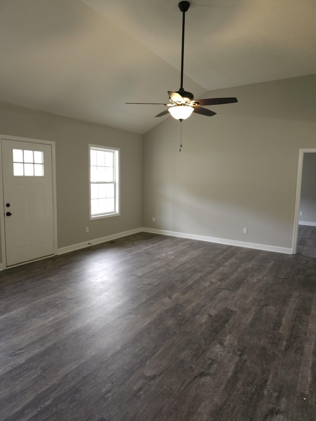 4070 Hartsville Rd, Lafayette, TN 37083 - unfurnished living room featuring a ceiling fan, lofted ceiling, and dark wood-style flooring