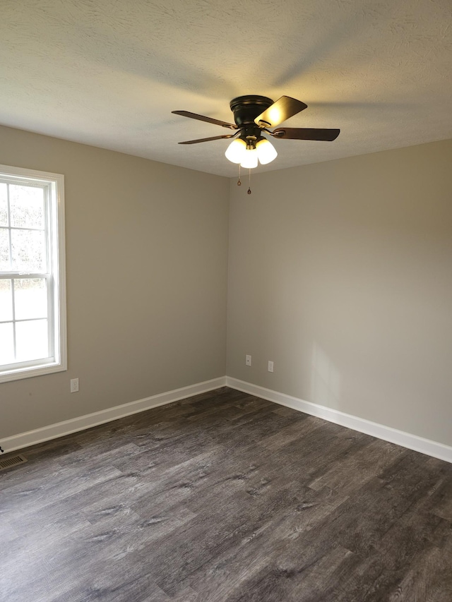 4070 Hartsville Rd, Lafayette, TN 37083 - spare room featuring dark wood finished floors and ceiling fan