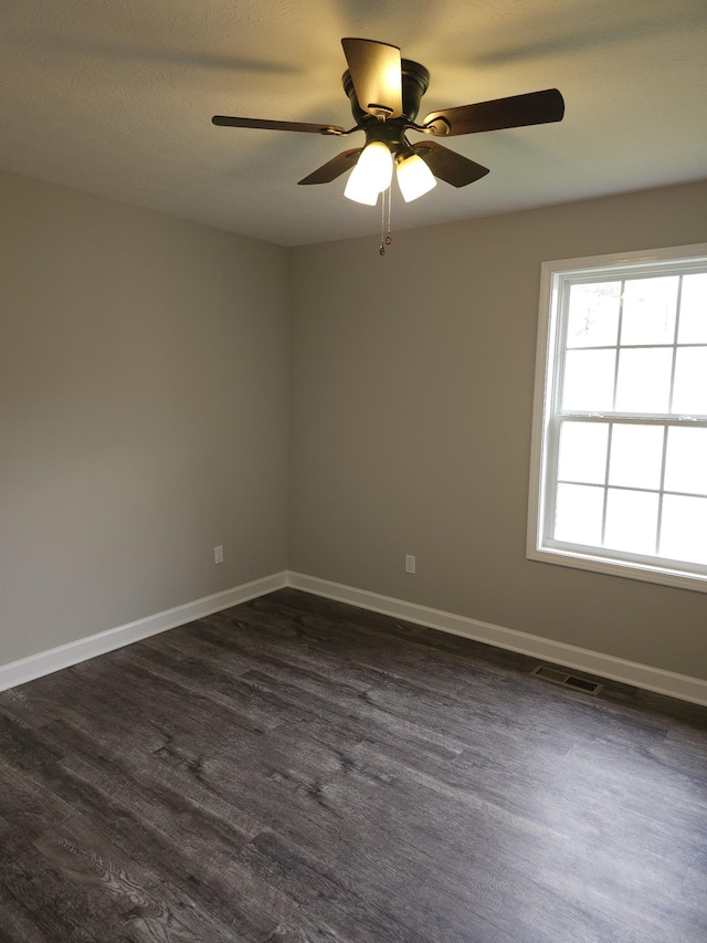 4070 Hartsville Rd, Lafayette, TN 37083 - unfurnished room with ceiling fan and dark wood-style flooring
