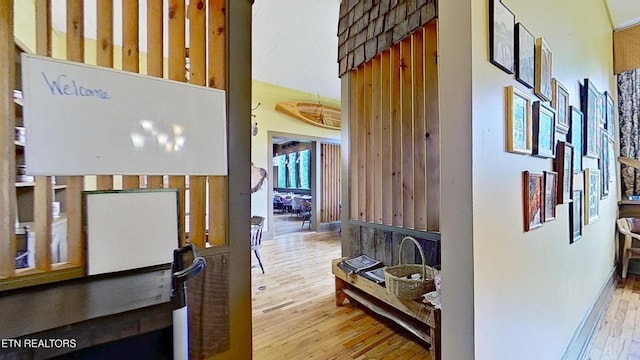 329 Wheeler Ln, Jamestown, TN 38556 - hallway featuring wood finished floors and a high ceiling