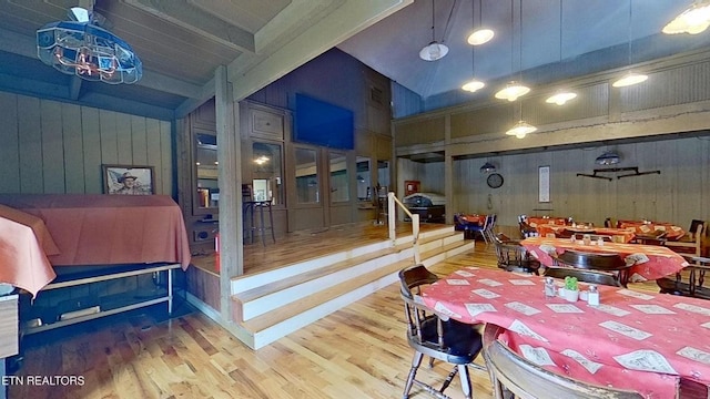 329 Wheeler Ln, Jamestown, TN 38556 - dining room with wooden walls, wood finished floors, and beam ceiling