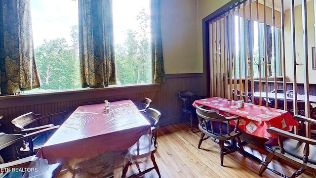 329 Wheeler Ln, Jamestown, TN 38556 - dining room with wainscoting, wood finished floors, and wood walls