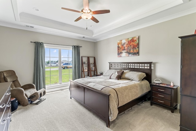 1446 Millstone Creek Rd, Lascassas, TN 37085 - bedroom with light colored carpet, a tray ceiling, and a ceiling fan