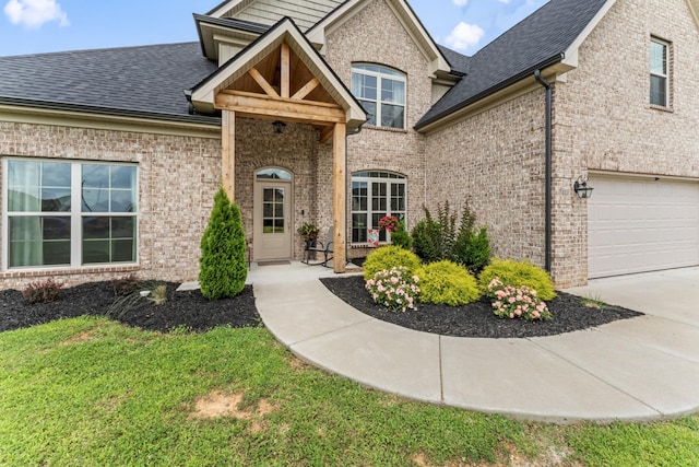 1446 Millstone Creek Rd, Lascassas, TN 37085 - view of front of property featuring roof with shingles, brick siding, an attached garage, and driveway