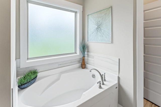 1446 Millstone Creek Rd, Lascassas, TN 37085 - bathroom with plenty of natural light and a bath