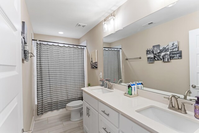 1446 Millstone Creek Rd, Lascassas, TN 37085 - full bathroom featuring double vanity, recessed lighting, and shower / bath combo with shower curtain