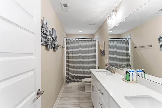 1446 Millstone Creek Rd, Lascassas, TN 37085 - full bathroom with double vanity, marble look tiles, recessed lighting, and a shower with shower curtain