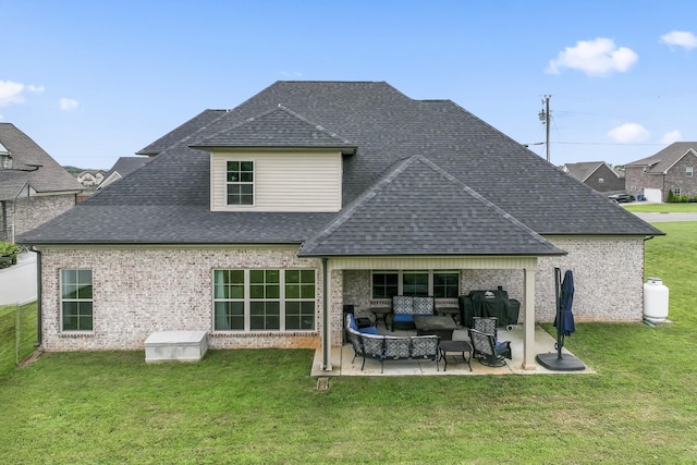 1446 Millstone Creek Rd, Lascassas, TN 37085 - back of property with a shingled roof, outdoor lounge area, a patio area, and a lawn