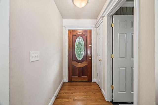 1134 Pee Dee Branch Rd, Cottontown, TN 37048 - doorway featuring baseboards and wood finished floors