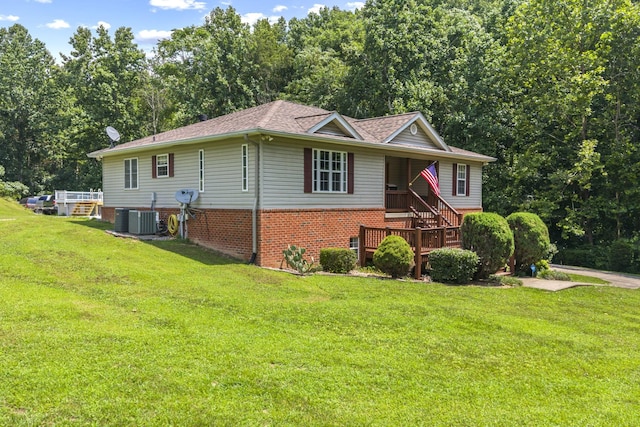 1134 Pee Dee Branch Rd, Cottontown, TN 37048 - ranch-style house with a front lawn, brick siding, and a shingled roof