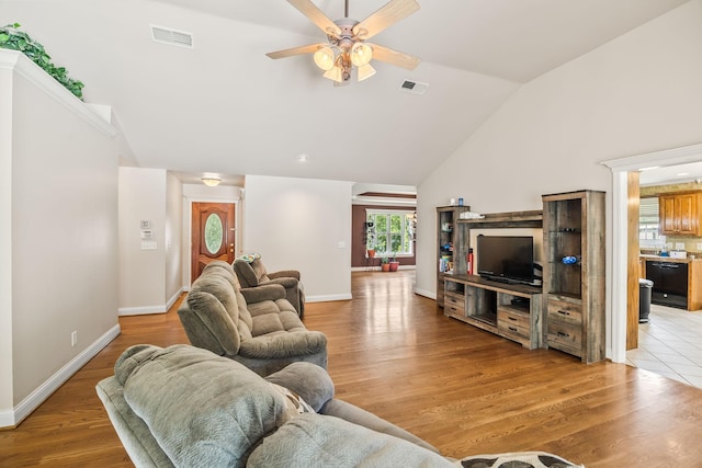 1134 Pee Dee Branch Rd, Cottontown, TN 37048 - living room with a ceiling fan, high vaulted ceiling, and light wood-type flooring