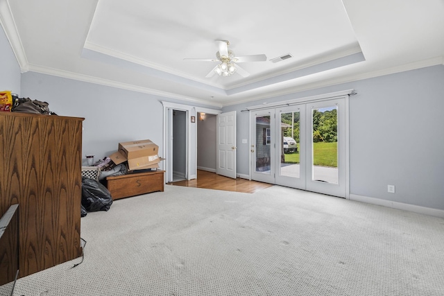 1134 Pee Dee Branch Rd, Cottontown, TN 37048 - carpeted bedroom featuring a tray ceiling, access to outside, crown molding, and ceiling fan
