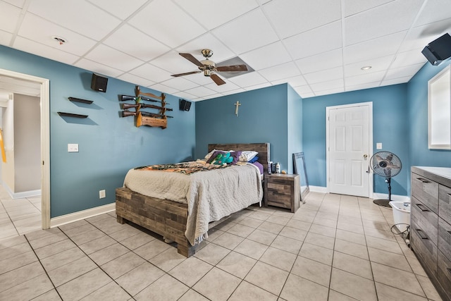 1134 Pee Dee Branch Rd, Cottontown, TN 37048 - bedroom with a drop ceiling, light tile patterned floors, and ceiling fan