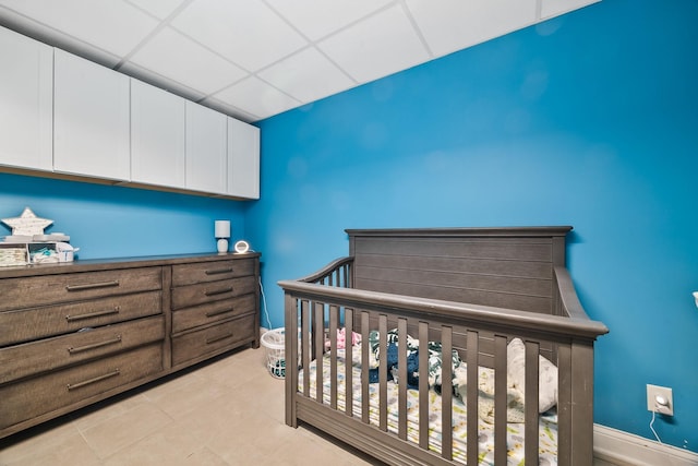 1134 Pee Dee Branch Rd, Cottontown, TN 37048 - bedroom featuring a drop ceiling and light tile patterned flooring