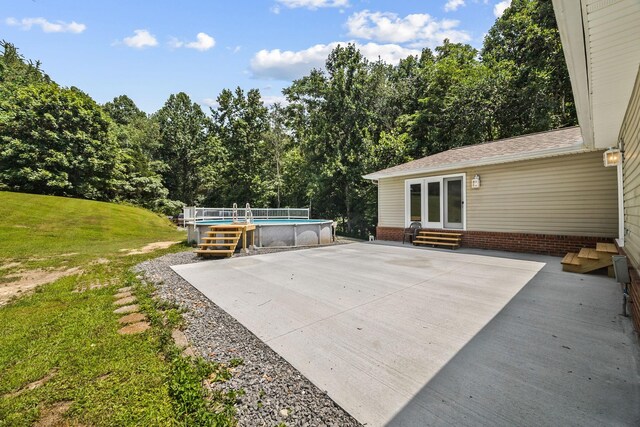 1134 Pee Dee Branch Rd, Cottontown, TN 37048 - view of patio with entry steps and an outdoor pool