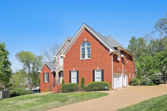 511 Derby Downs, Lebanon, TN 37087 - view of front of home featuring concrete driveway, brick siding, and a garage