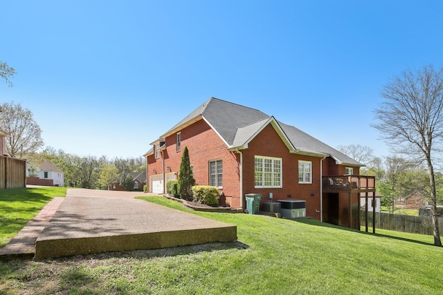 511 Derby Downs, Lebanon, TN 37087 - view of side of property with a garage, asphalt driveway, and brick siding