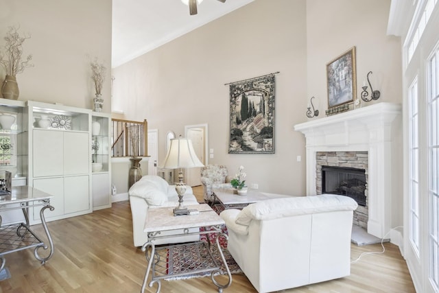 511 Derby Downs, Lebanon, TN 37087 - living area featuring high vaulted ceiling, wood finished floors, a stone fireplace, and ceiling fan
