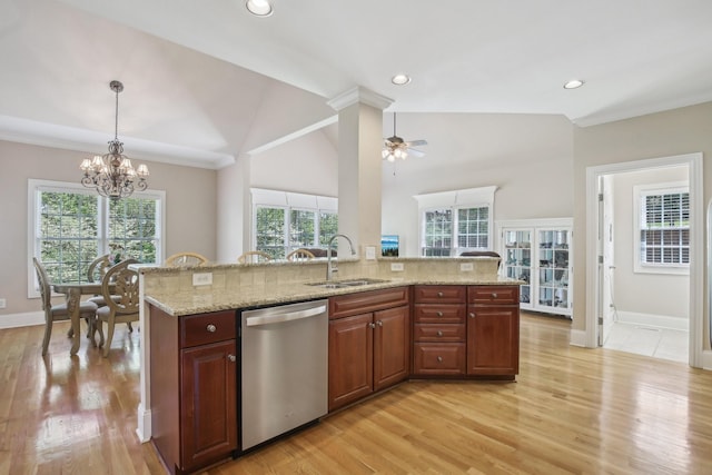 511 Derby Downs, Lebanon, TN 37087 - kitchen featuring stainless steel dishwasher, ceiling fan, hanging light fixtures, light wood-type flooring, and light stone counters