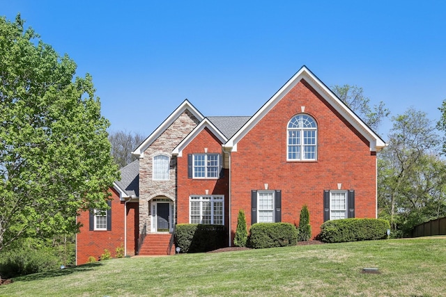 511 Derby Downs, Lebanon, TN 37087 - traditional-style house featuring a front lawn and brick siding