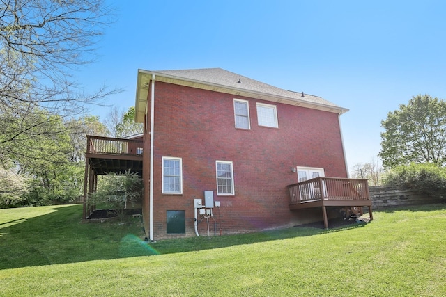 511 Derby Downs, Lebanon, TN 37087 - rear view of house featuring a wooden deck, a lawn, and brick siding